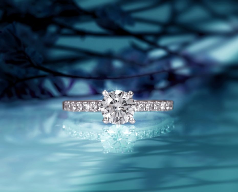 Diamond,Engagement,Ring,On,Abstract,Color,Background Diamond,Engagement,Ring,On,Abstract,Color,Background